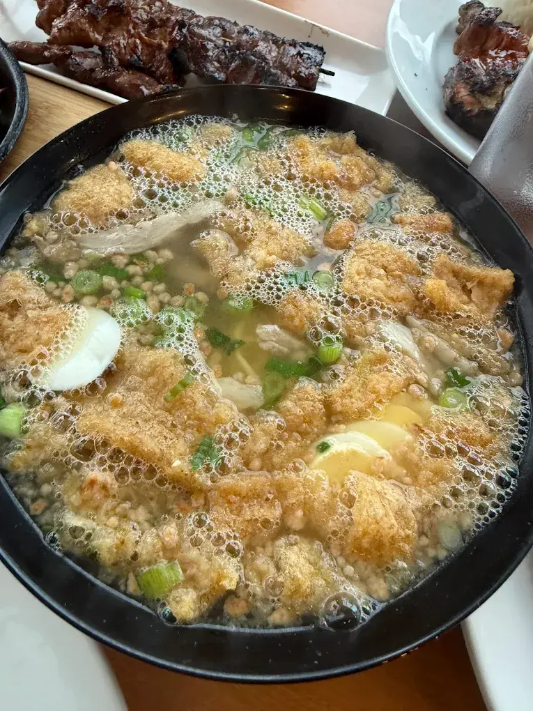 Garlic Rice with roasted garlic at Chicken House & Catering Edmonton